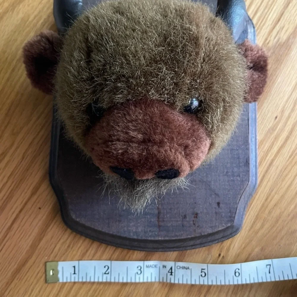 Plush mounted animal heads. Kids room - cabin  humor